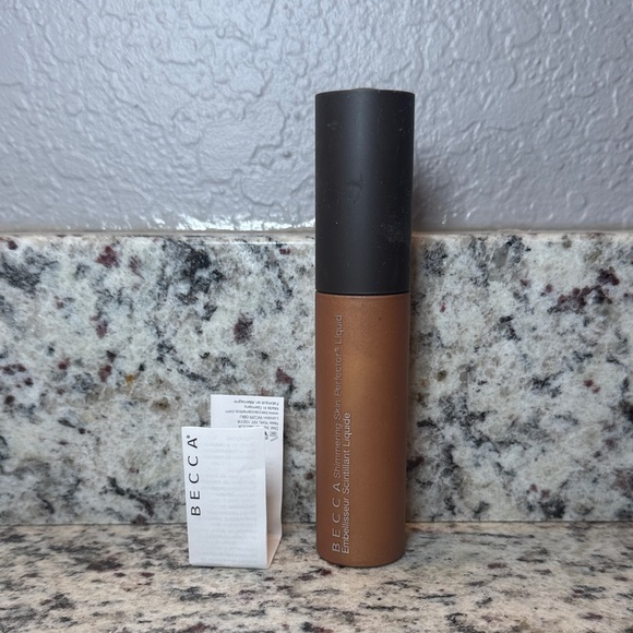 BECCA Other - BECCA Topaz Shimmering Skin Perfector Liquid